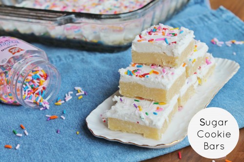 Perfect Sugar Cookie Bars: soft, chewy, a healthy layer of vanilla icing...these are one of the most popular treats I bake!