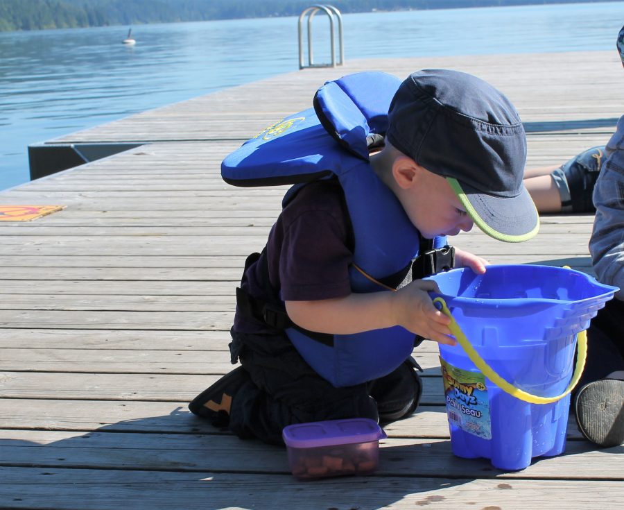 Checking out the day's catch: 3 little fishies :)